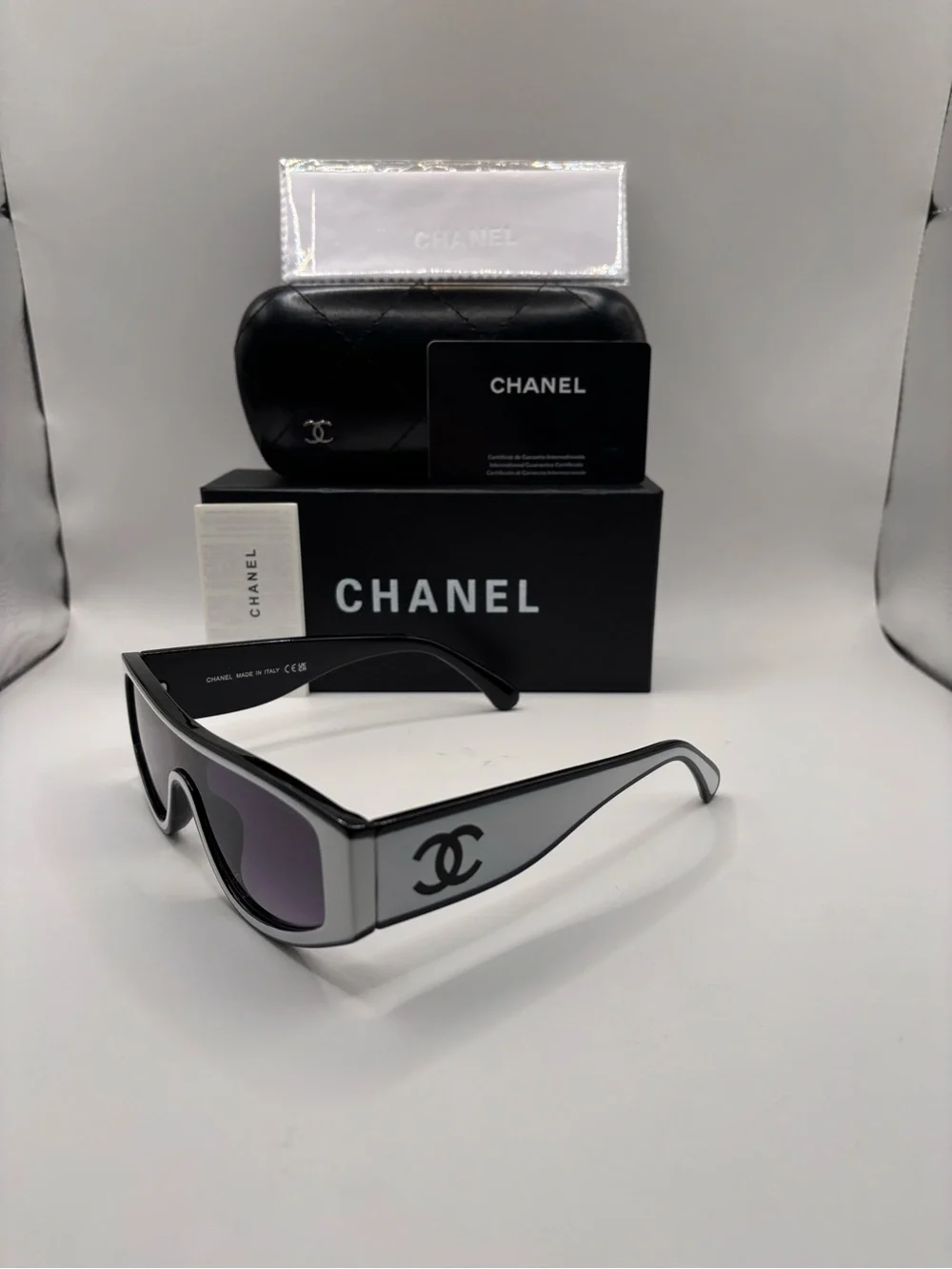 CHANEL Black Shield Sunglasses with Purple Gradient Lenses